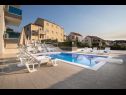 Apartmaji Ivan - with heated pool and seaview: A1(4), B1(4) Postira - Otok Brač  - hiša