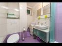 Apartmaji Palmina - comfort apartment: A1 veliki (6),  A2 žuti (4+1), A3 lila (2), SA4 bijeli (2) Makarska - Riviera Makarska  - Apartma -  A2 žuti (4+1): kopalnica s straniščem