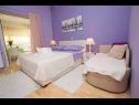 Apartmaji Palmina - comfort apartment: A1 veliki (6),  A2 žuti (4+1), A3 lila (2), SA4 bijeli (2) Makarska - Riviera Makarska  - Apartma - A3 lila (2): spalnica