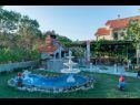 Apartmaji Mig - with beautiful garden: A1(2+1), A3(4+1), A4(4+1) Supetarska Draga - Otok Rab  - dvorišče