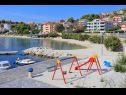 Apartmaji Pero - 70m from the sea: A1(6), A2(2) Marina - Riviera Trogir  - plaža