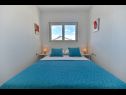 Apartmaji Vera - with nice view: A2-prvi kat (6), A1-prizemlje(4), A3-potkrovlje(6) Trogir - Riviera Trogir  - Apartma - A1-prizemlje(4): spalnica