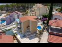 Apartmaji Dalis - open swimming pool: A1 kat(4+1), A2 prizemlje(4) Zaliv Osibova (Milna) - Otok Brač  - Hrvaška  - hiša