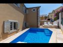 Apartmaji Dalis - open swimming pool: A1 kat(4+1), A2 prizemlje(4) Zaliv Osibova (Milna) - Otok Brač  - Hrvaška  - hiša