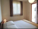 Apartmaji Smilja - 150 m from pebble beach: A1(2+2), A2(2+1), SA3(2) Baška Voda - Riviera Makarska  - Apartma - A1(2+2): spalnica