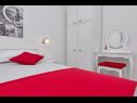 Apartmaji Smi - 250 m from sea: A1 juzni(2+1), A2 sjeverni(2+1), A3(4) Makarska - Riviera Makarska  - Apartma - A1 juzni(2+1): spalnica