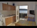 Apartmaji Petar - 6m from the sea: A1(4), A3(2) Barbat - Otok Rab  - Apartma - A1(4): kuhinja in jedilnica