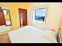 Apartmaji Sretan A1-Rogač(5+1), A2-Višnja(4+1), A3-Kiwi(2+1) Zaliv Ljubljeva (Vinišće) - Riviera Trogir  - Hrvaška  - Apartma - A1-Rogač(5+1): spalnica